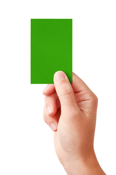 Рука, що показує зелену картку — стокове фото