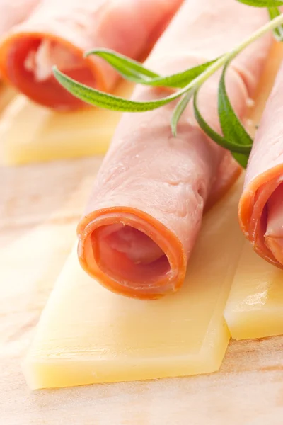 Slices of ham and cheese — Stock Photo, Image