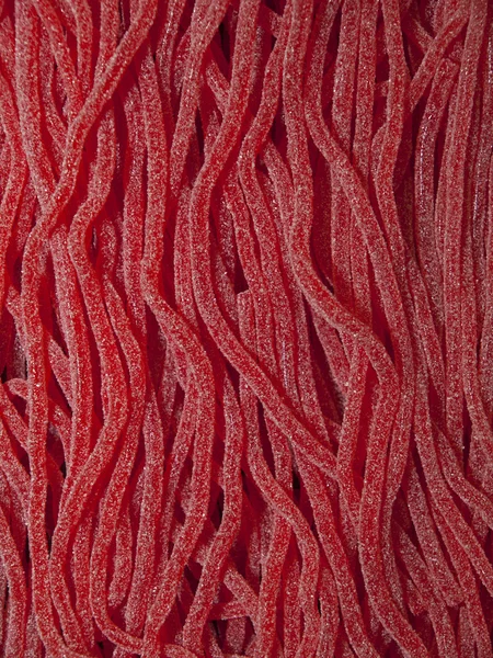 Sfondo rosso dolce tagliatelle — Foto Stock