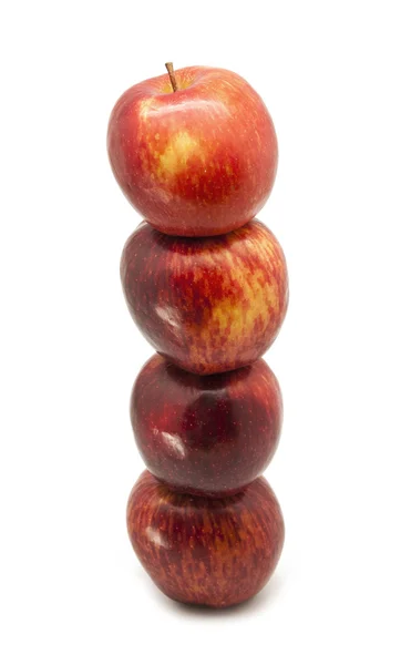 Geïsoleerde gestapelde appels — Stockfoto