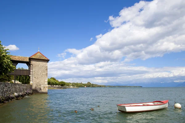 Rowboat in the Rolle Castle jetty in Switzerland — Stock Photo, Image