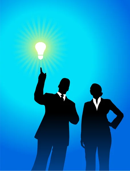 Business team silhouettes with light bulb — Stock Vector