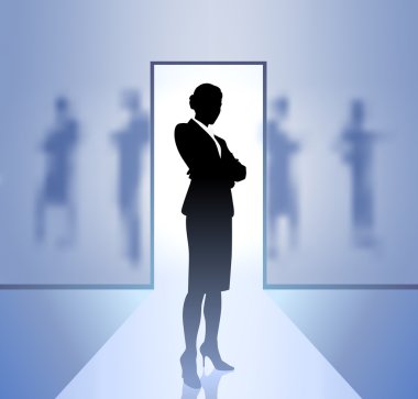 Businesswoman executive in focus on blurry background clipart