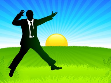 Excited Businessman on Sunrise Background clipart