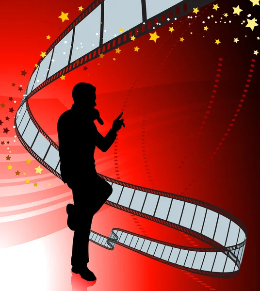 Chanteur sur fond rouge avec bobine de film — Image vectorielle