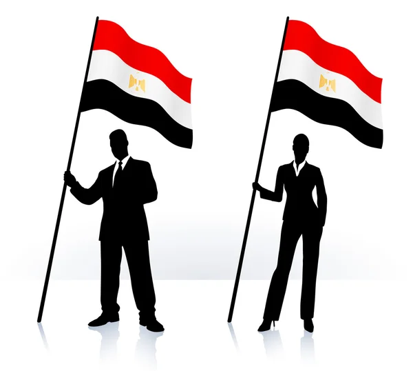 Business silhouettes with waving flag of Egypt — Stock Vector