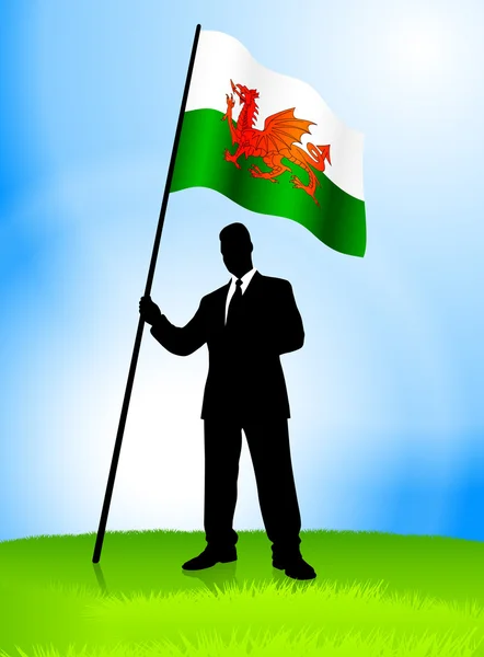 Businessman Leader Holding Wales Flag — Stock Vector