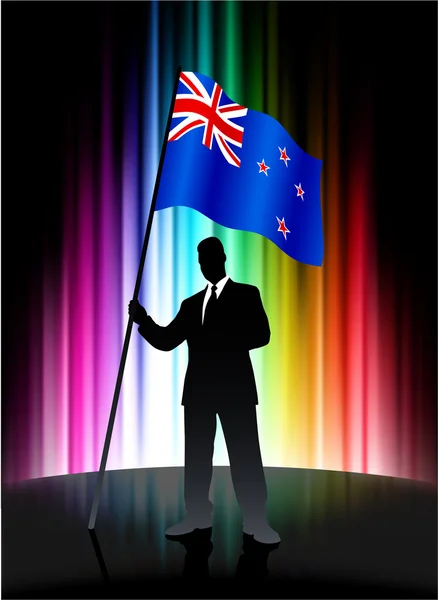 Novozélandská vlajka s podnikatel na abstraktní spektra poza — Stockový vektor