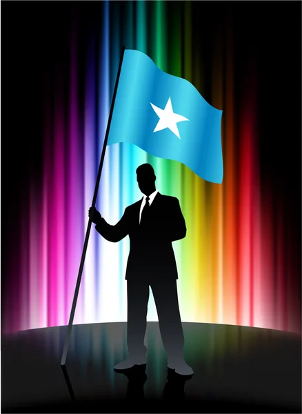 Somalië vlag met zakenman op abstracte spectrum achtergrond — Stockvector