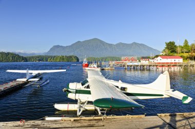 Sea planes at dock in Tofino, Vancouver Island, Canada clipart