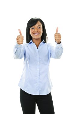 Smiling young woman giving thumbs up clipart