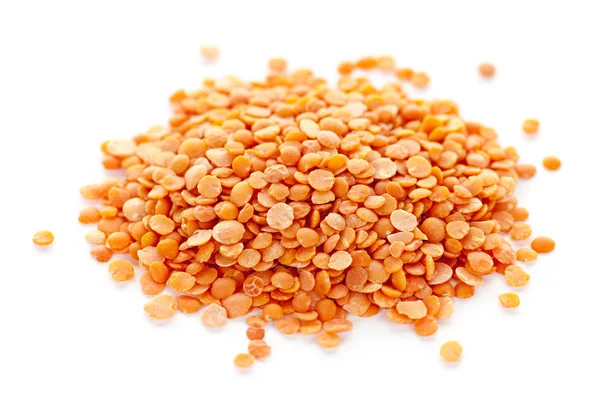 Pilha de lentilhas vermelhas não cozidas — Fotografia de Stock
