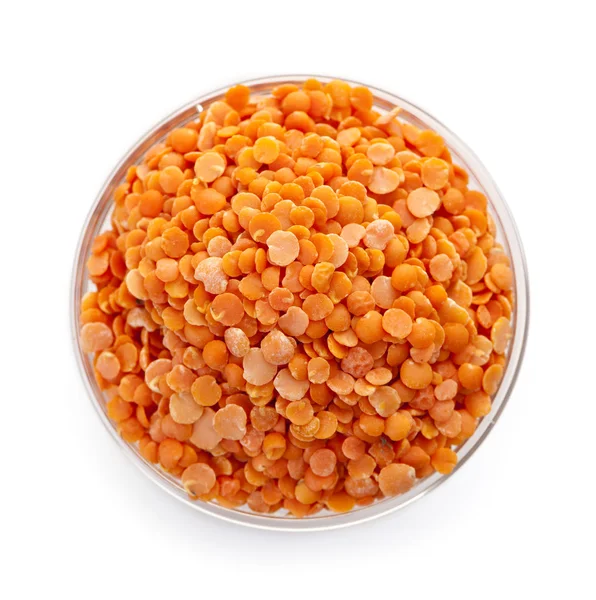 Red lentils in a bowl from above — Stock Photo, Image