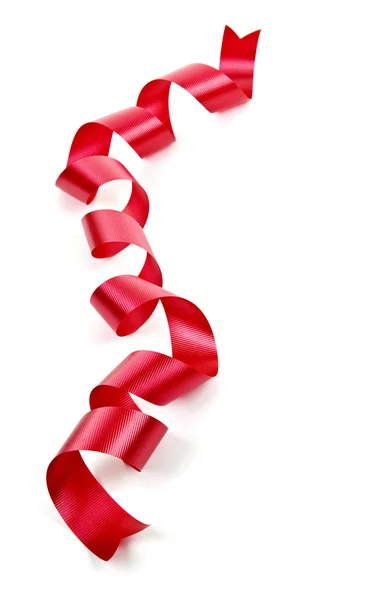 Кёрлинговая красная праздничная лента — стоковое фото