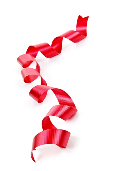 Кёрлинговая красная праздничная лента — стоковое фото
