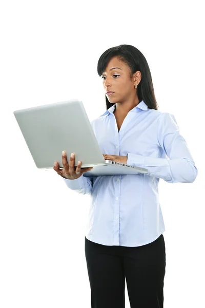 Mulher séria com computador portátil — Fotografia de Stock