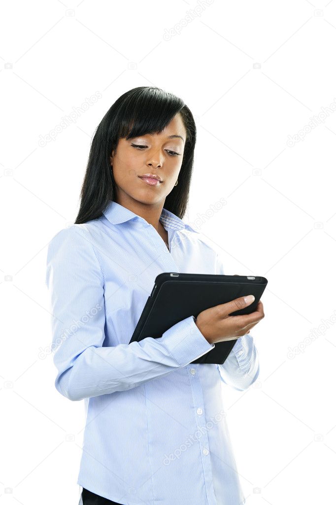 Serious woman with tablet computer