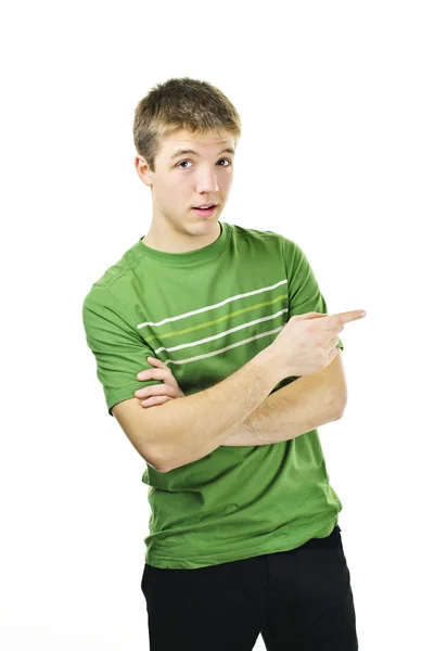 Young man pointing to the side Stock Photo