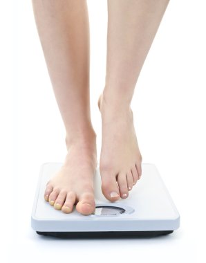 Feet on bathroom scale clipart