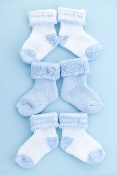 Meias de bebê azul — Fotografia de Stock