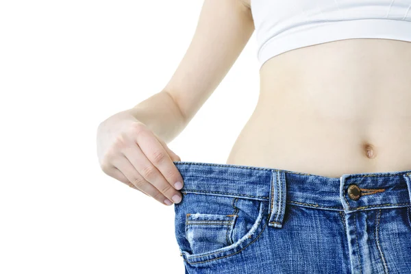 Mulher mostrando perda de peso — Fotografia de Stock