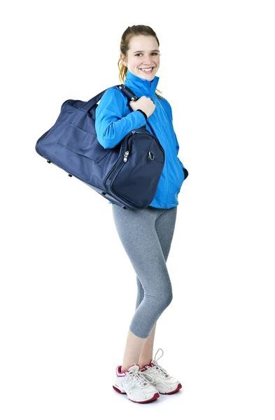 Sportowe dziewczyna z torbie gotowy do treningu — Zdjęcie stockowe
