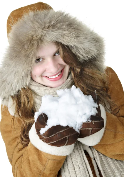 Speelse winter meisje bedrijf sneeuw — Stockfoto