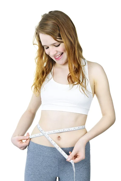 Healthy girl measuring her waist — Stock Photo, Image