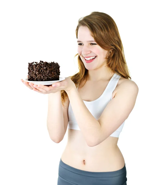 Chica joven sosteniendo pastel de chocolate — Foto de Stock