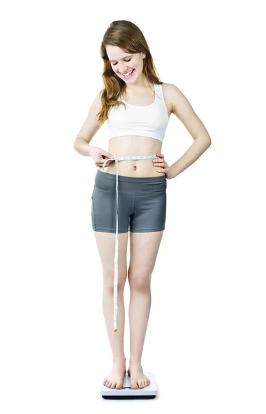 Chica joven perdiendo peso — Foto de Stock