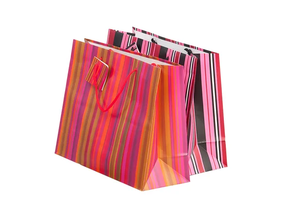 Dois sacos de papel listrado para compras, isolados — Fotografia de Stock