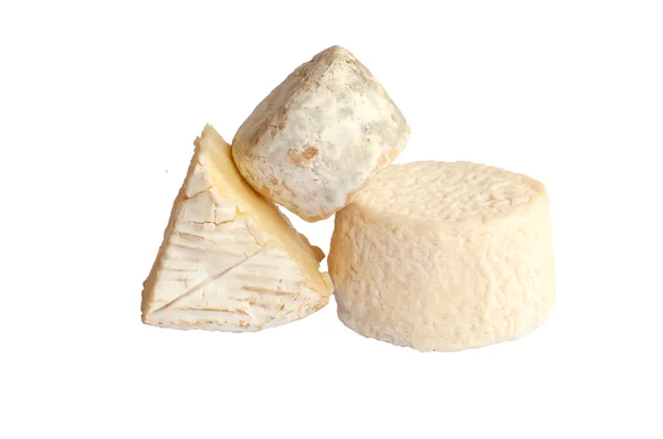 Francouzské sýry: crottin a hermelín, izolované Stock Obrázky