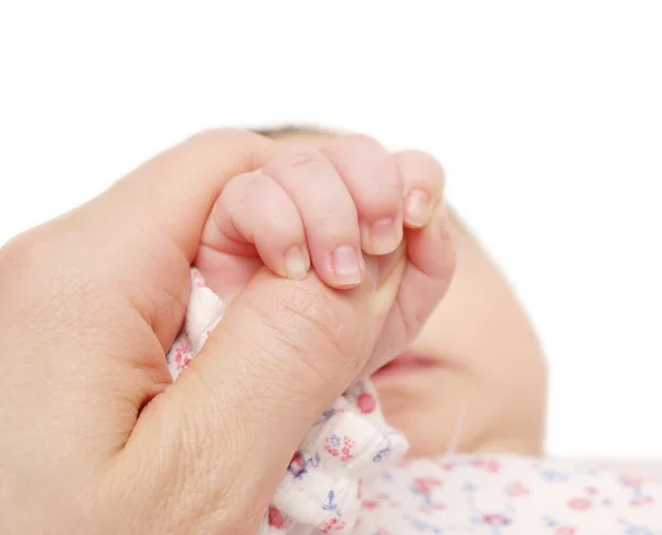 Bebé sosteniendo una mano de adultos — Foto de Stock
