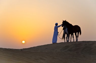 Arap adam Arap atı ile