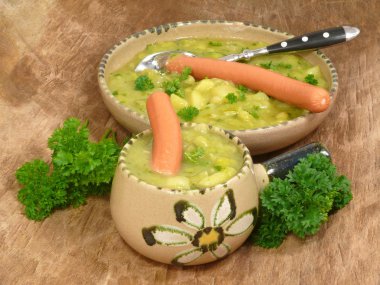 Pea soup with sausage clipart