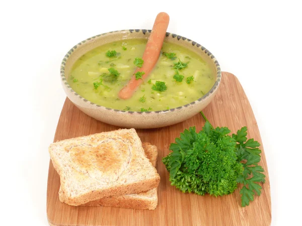 Гороховий суп з сосискою — стокове фото