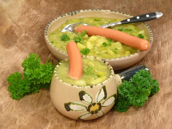 stock image Pea soup with sausage