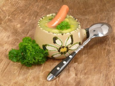 Pea soup with sausage clipart