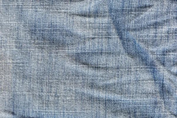 stock image Abstract background crumpled jeans.