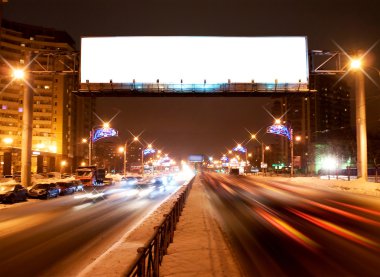 Light billboard on the night street of Sankt-Petersburg clipart
