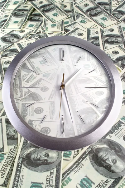 Clock on the 100 dollar banknotes — Stock Photo, Image