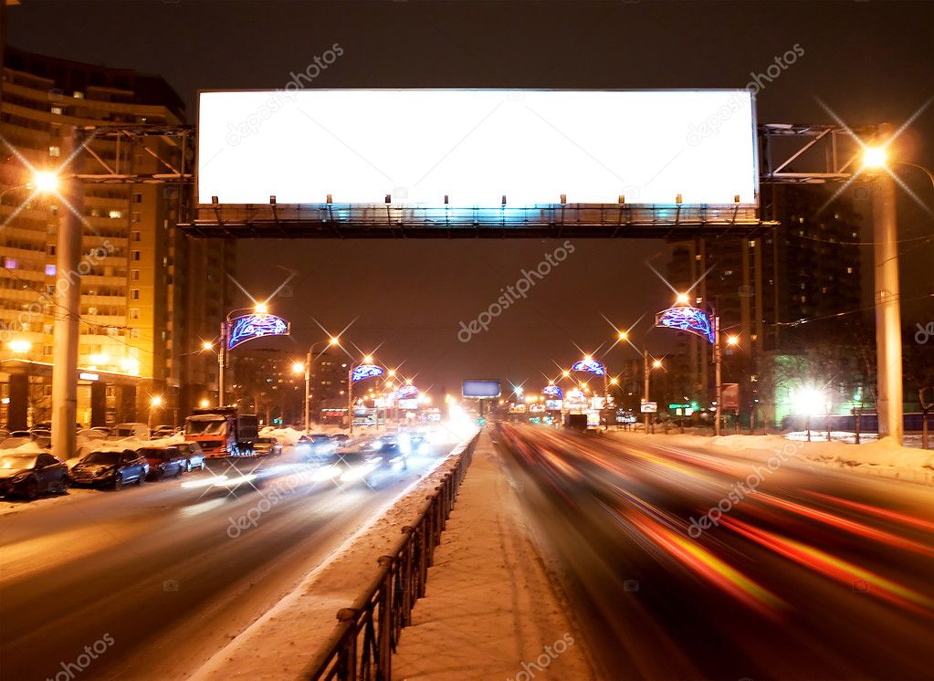 Light billboard on the night street of Sankt-Petersburg