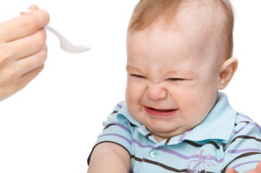 Little boy refuses to eat clipart