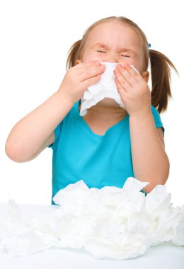 Little girl blows her nose clipart