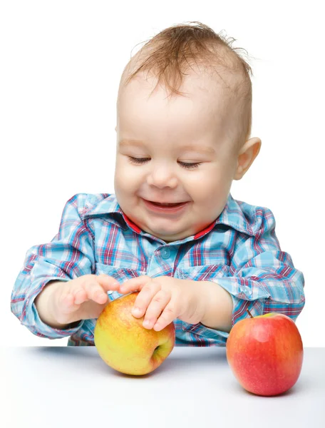 Little child with apple Royalty Free Stock Images
