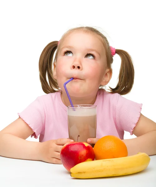 stock image Little girl drinks fruit juice