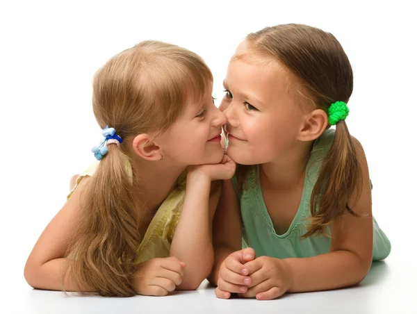 Two little girls are playing Royalty Free Stock Images