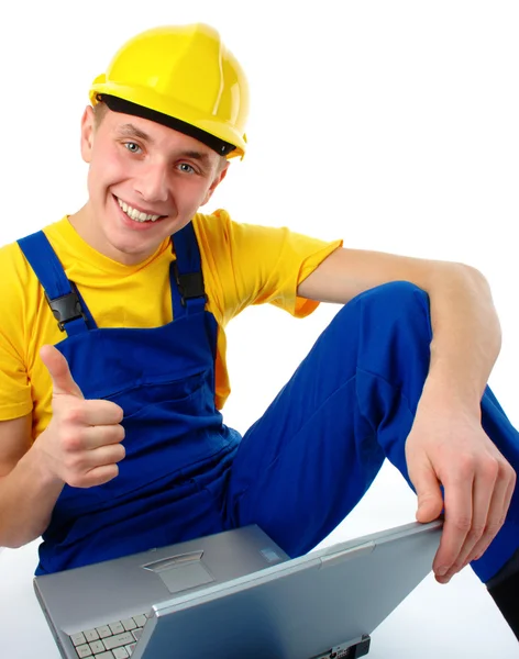 Young construction worker showing good sign — Stock Photo, Image