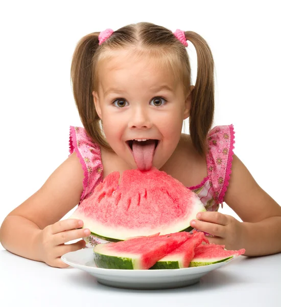 stock image Cute little girl is going to eat watermelon