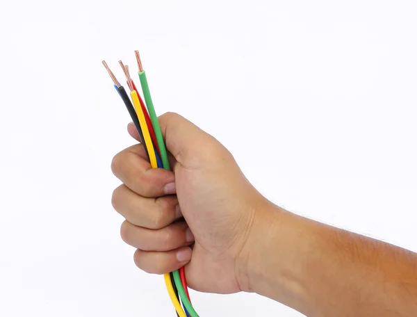 Hand som håller kabel — Stockfoto